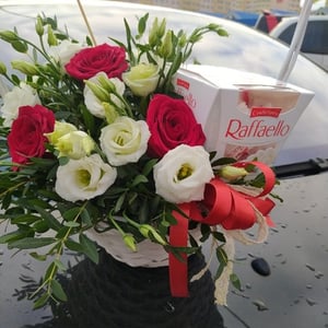 Basket with flowers and sweets