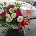 Basket with flowers and sweets