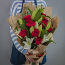 5 lilies and 9 red roses