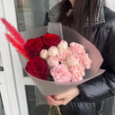 Bouquet of red roses, pink roses and Dianthus
