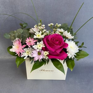 Arrangement of chrysanthemums and roses