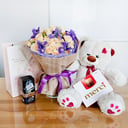 Attraction with candies, coffee, and a teddy bear