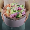 Box with flowers and macarons
