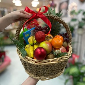 Fruit basket with sweets