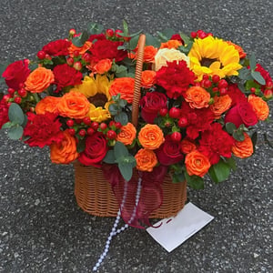 Sunflowers and roses basket