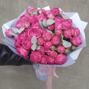 A single-variety bouquet of peony-flowered shrub roses.