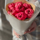 Bouquet of coral peonies in craft paper 80
