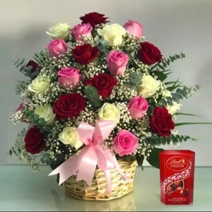 25 Mixed color roses arranged in basket