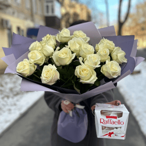 19 white roses with candy decoratio