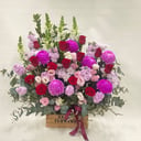 Flower box 'A charming floral arrangement in a wooden box.'