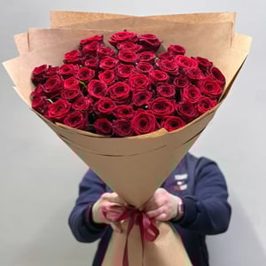 Bouquet '51 red roses in a craft'