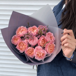 Bouquet of peony roses and chamelacium