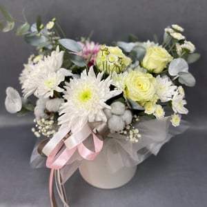 Arrangement of chrysanthemums, roses and gerberas