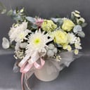 Arrangement of chrysanthemums, roses and gerberas