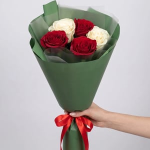 A bouquet of five fresh red-and-white roses.