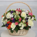 Flower basket 'French tune: Cymbidiums, Spray Roses and Lisianthuses'