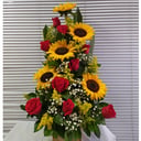Ikebana of roses and sunflowers