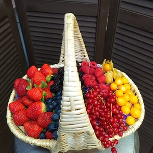 Basket with fruits and berries