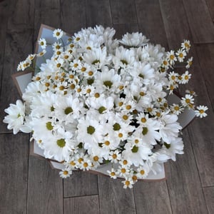 Bouquet of chrysanthemums and field daisies