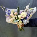 Arranged bouquet with white anemone